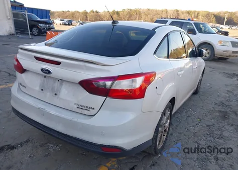 2012 Ford Focus Titanium z USA, uszkodzony, nr VIN 1FAHP3J20CL428059